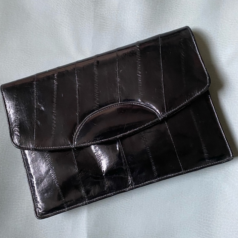 Buttery soft luxurious eel skin black clutch